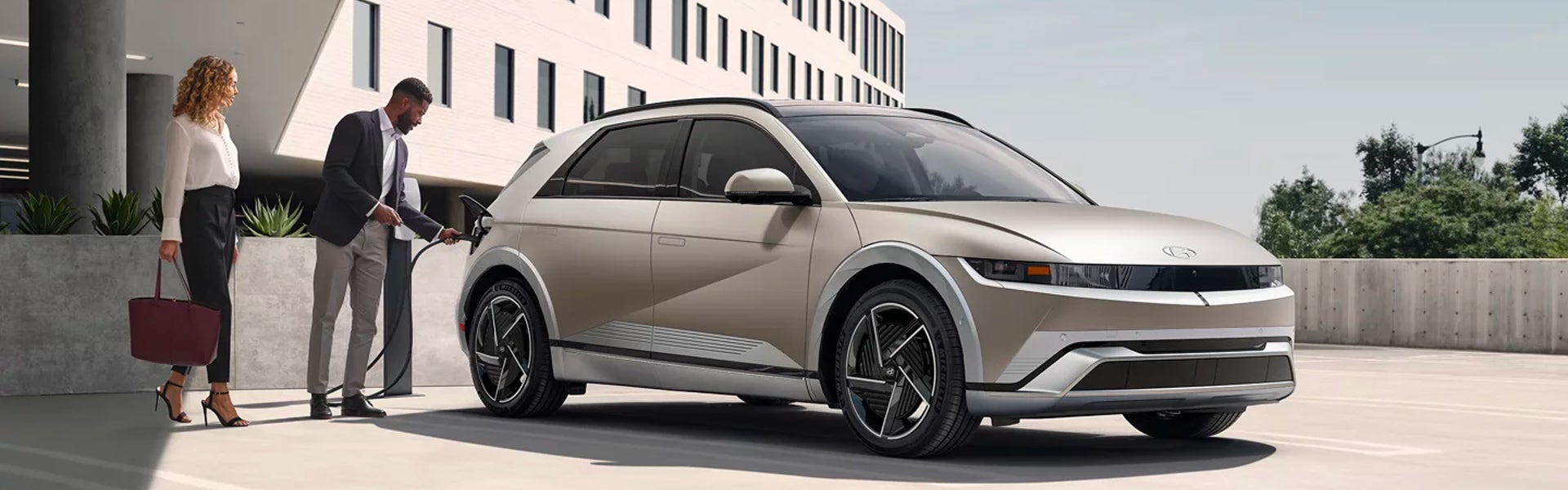 hyundai ioniq5 electric car charging at station near office