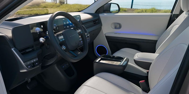 electric car interior front seats and center console view