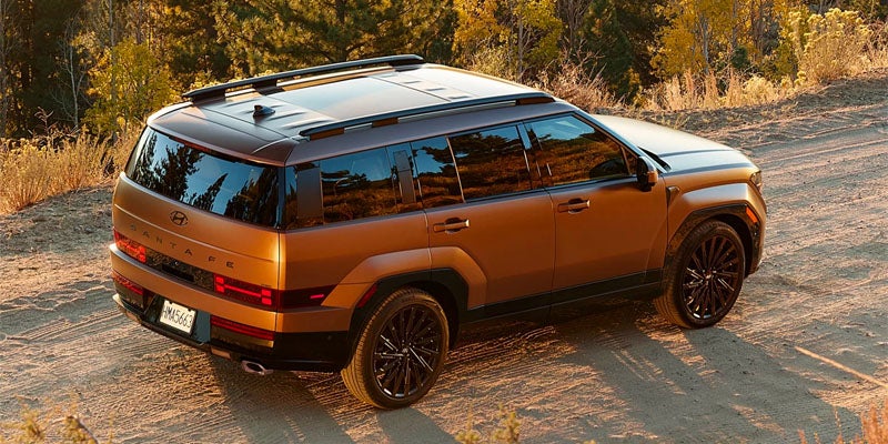 A 2026 Hyundai Santa Fe parked outdoors, showcasing its rugged design and sleek exterior features.